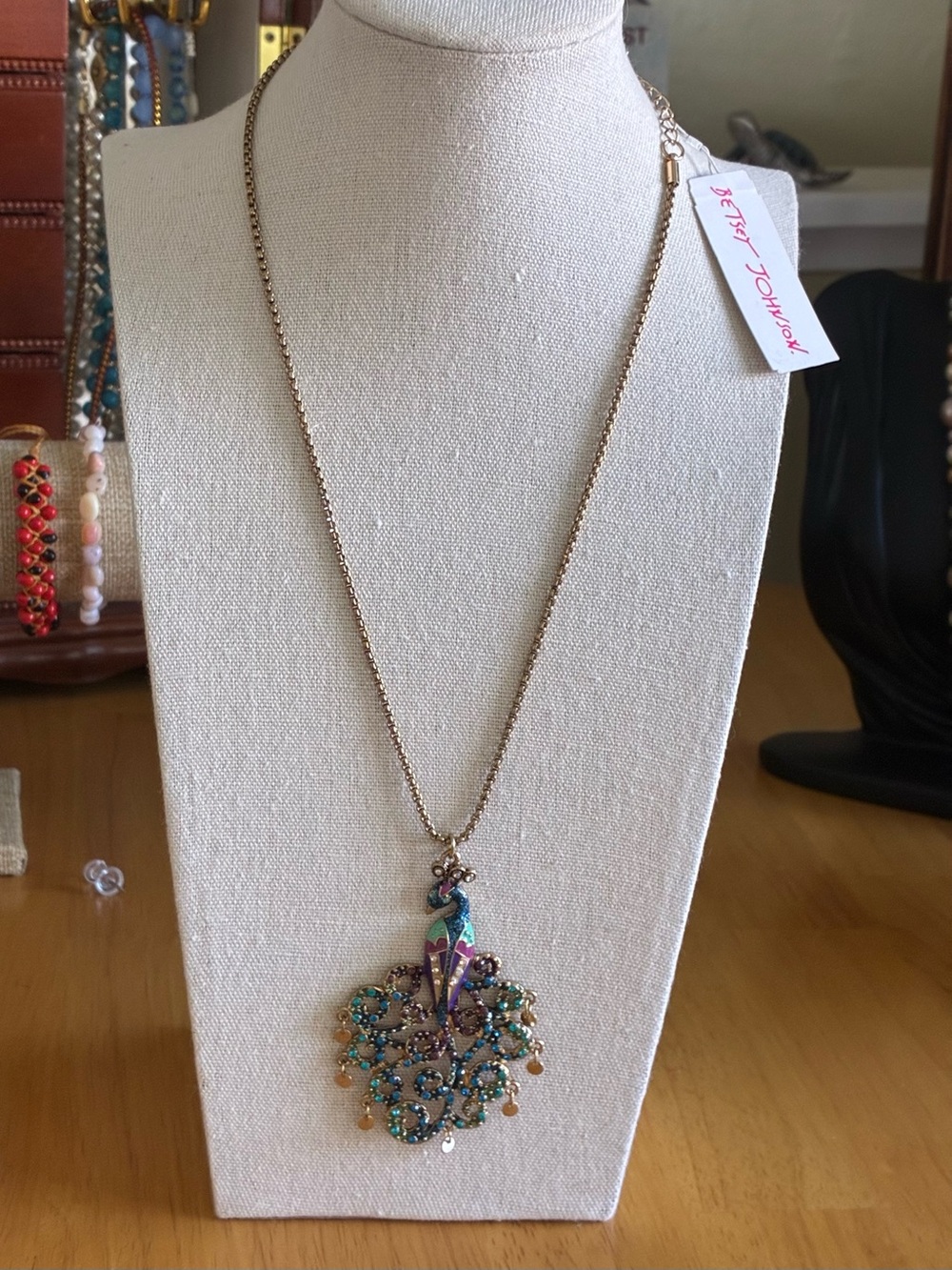 The selected item is the Betsey Johnson Moroccan Adventure Pendant Necklace.